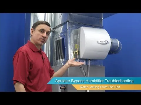 Maintenance tools and a replacement water panel filter for a home humidifier.