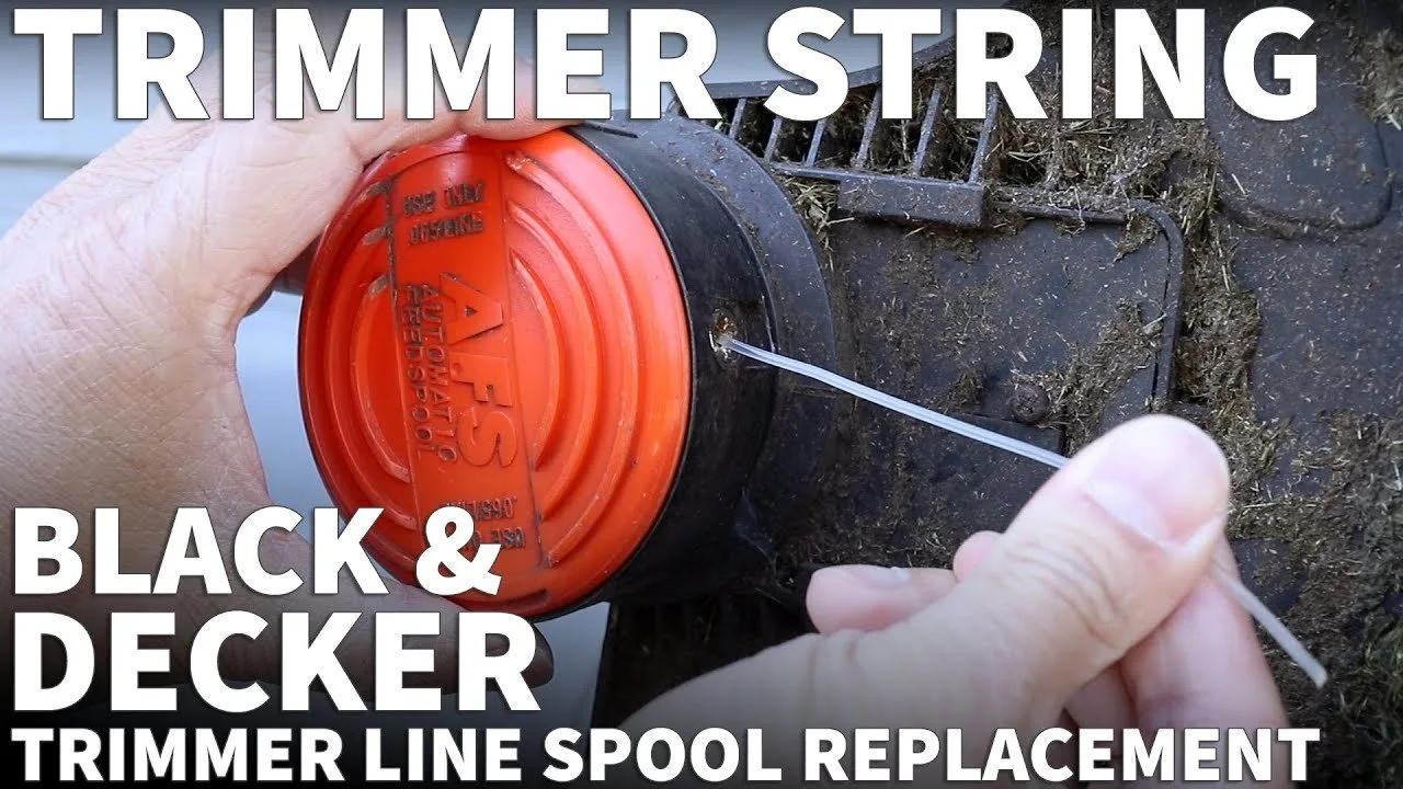 A close inspection of a string trimmer head to diagnose a faulty automatic feed spool.