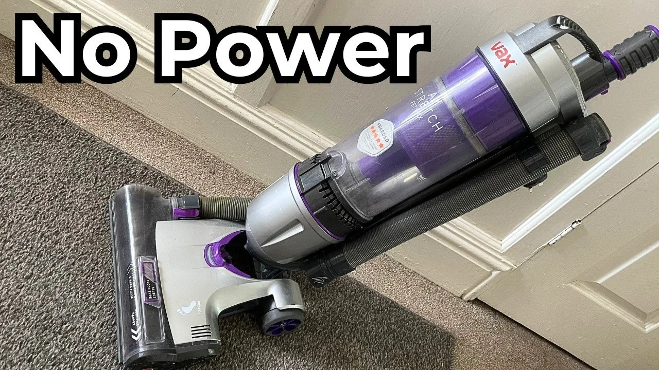 A tidy workspace with vacuum charging accessories for answering frequently asked maintenance questions.