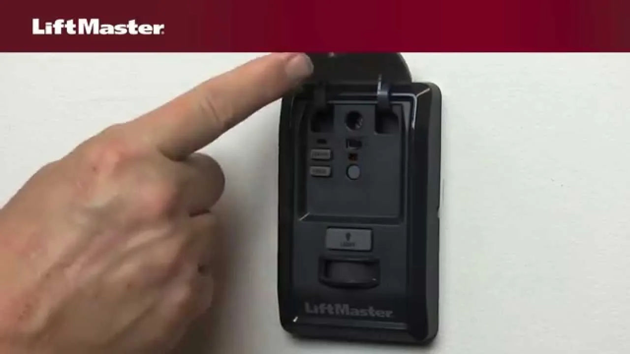 Electronic logic board inside a garage door opener motor housing unit.