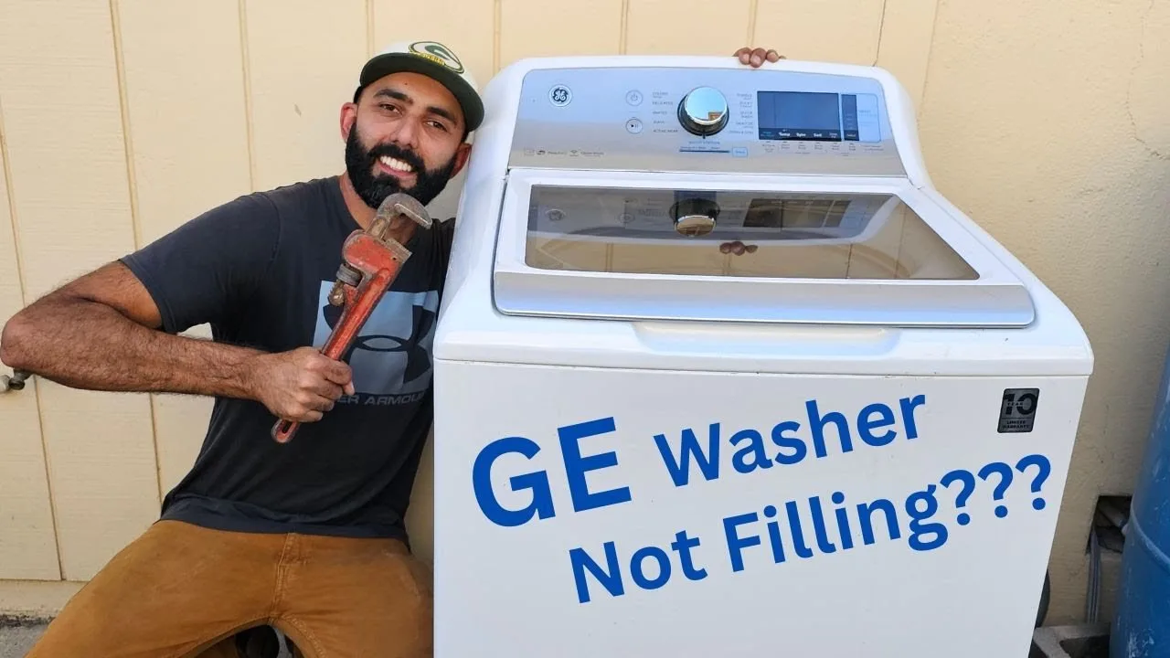 A well organized laundry room with a washing machine and a manual.