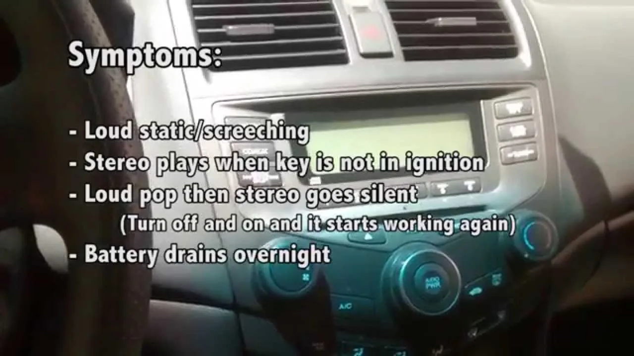 A mechanic inspecting the fuse box of a Honda Accord to troubleshoot stereo issues.