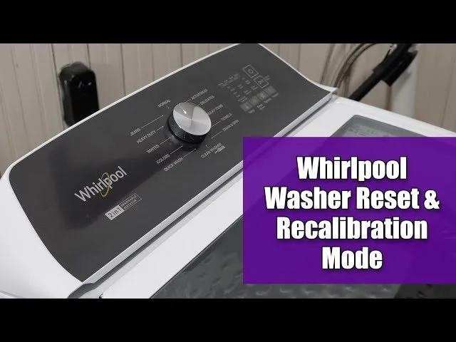 The control panel of a Whirlpool washer showing successful reset indicators.