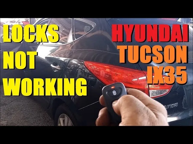 Professional automotive diagnostic tools and a repair manual on a clean workbench.