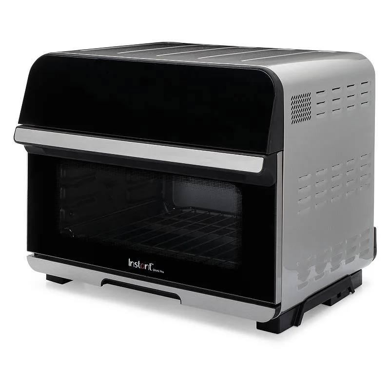 A clean kitchen workspace with an Instant Omni Pro and a notebook nearby.