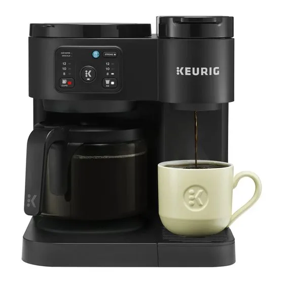 Hands carefully reinserting a coffee machine water reservoir to reset the system.