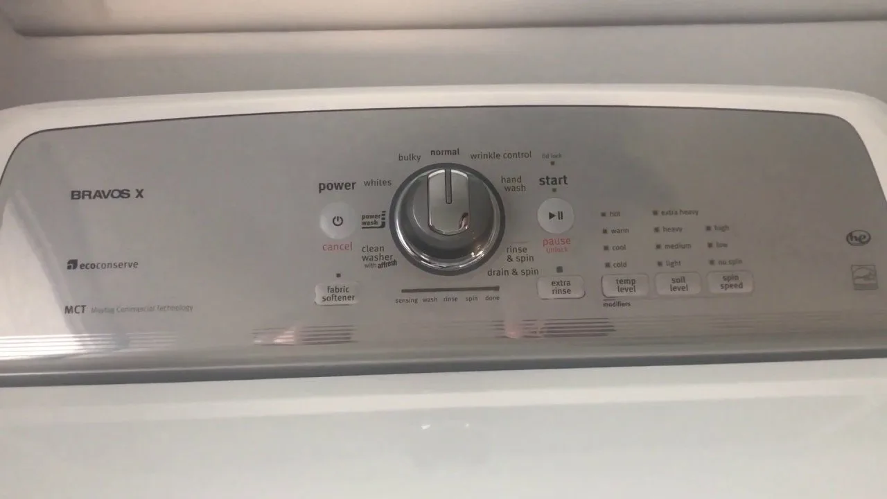 The digital control panel of a Maytag Bravos washer displaying an error code.