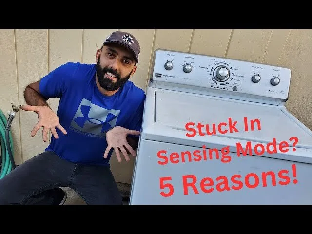 Checking the lid lock mechanism on a washing machine for debris.