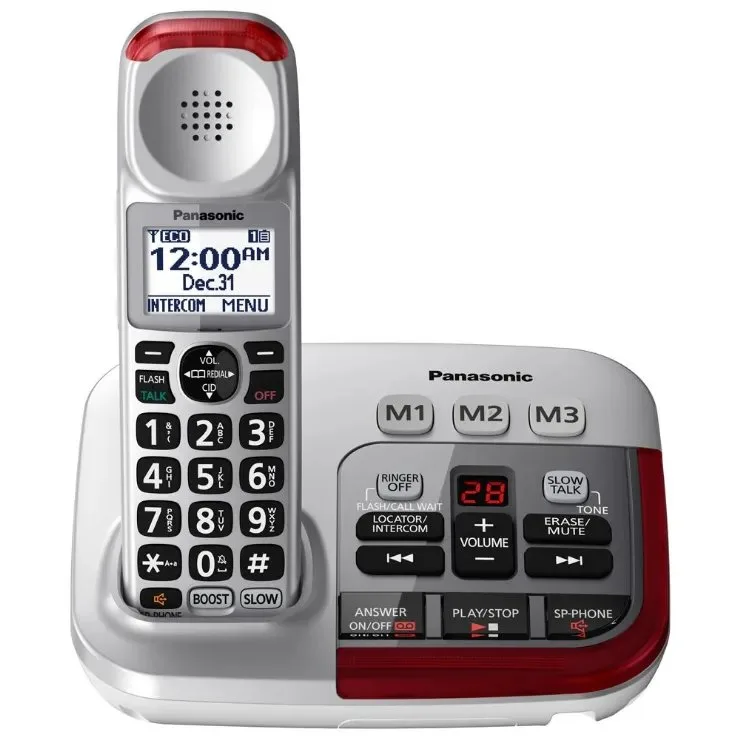A person reading a manual to troubleshoot their cordless phone.