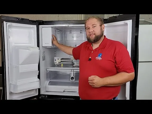 A digital thermometer inside a freezer indicates the temperature is five degrees Fahrenheit.