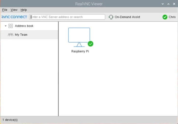 A person checking the VNC service status on a laptop connected to a Raspberry Pi.