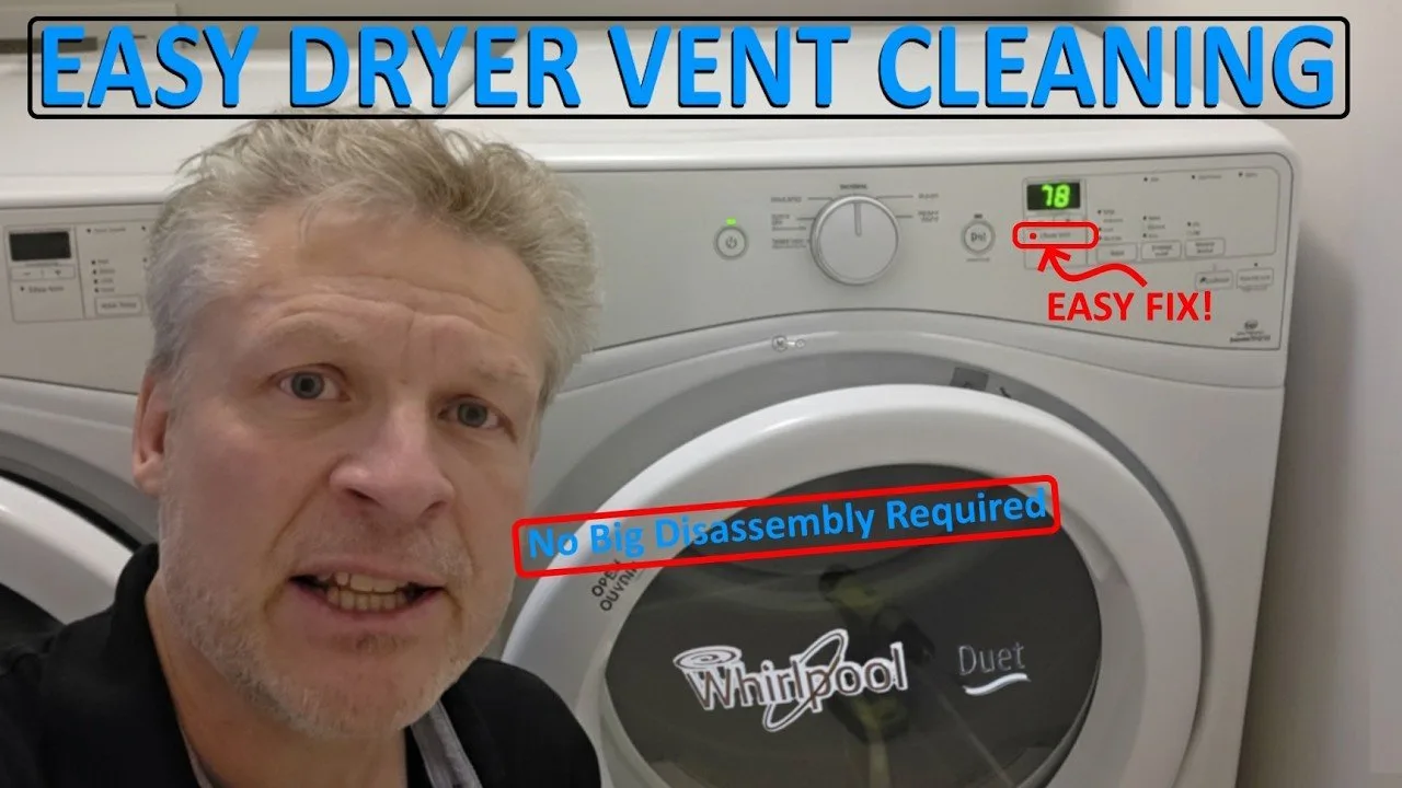 An open repair manual resting on a shelf near a Whirlpool Duet dryer.