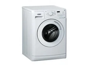 A hand unplugs a washing machine power cord from the wall.